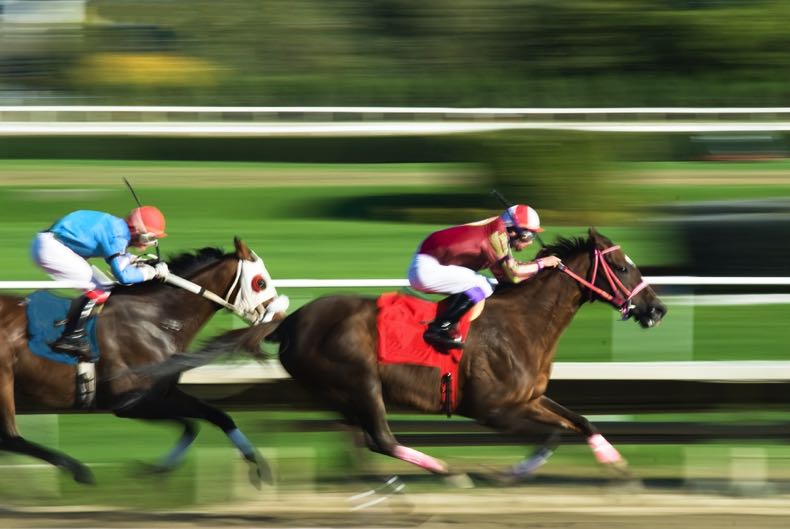 Blurred horse racing