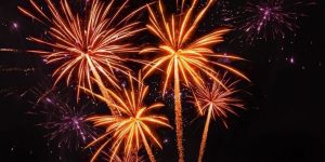 Orange fireworks with black background