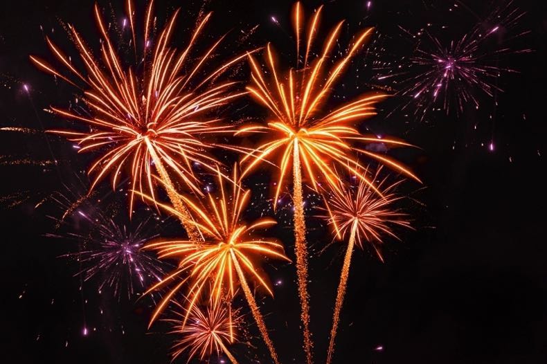 Orange fireworks with black background