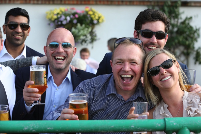 Group of friends at racecourse