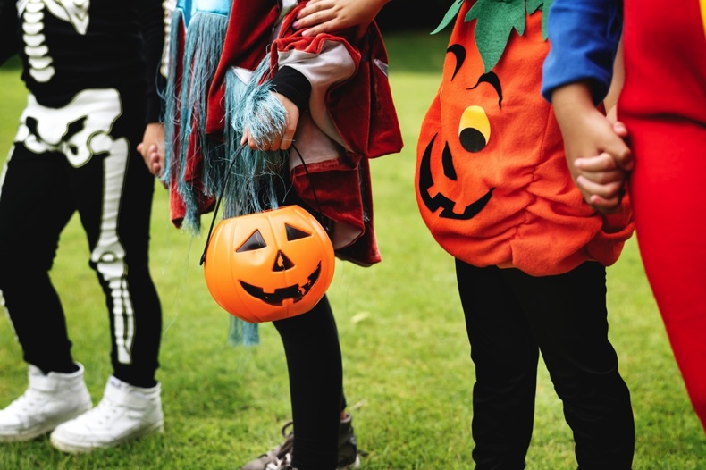 Kids in Halloween costumes